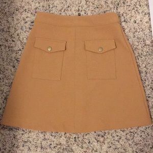 dark tan denim-ish material skirt